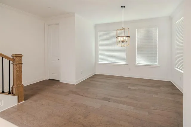 a white toilet sitting next to a white sink