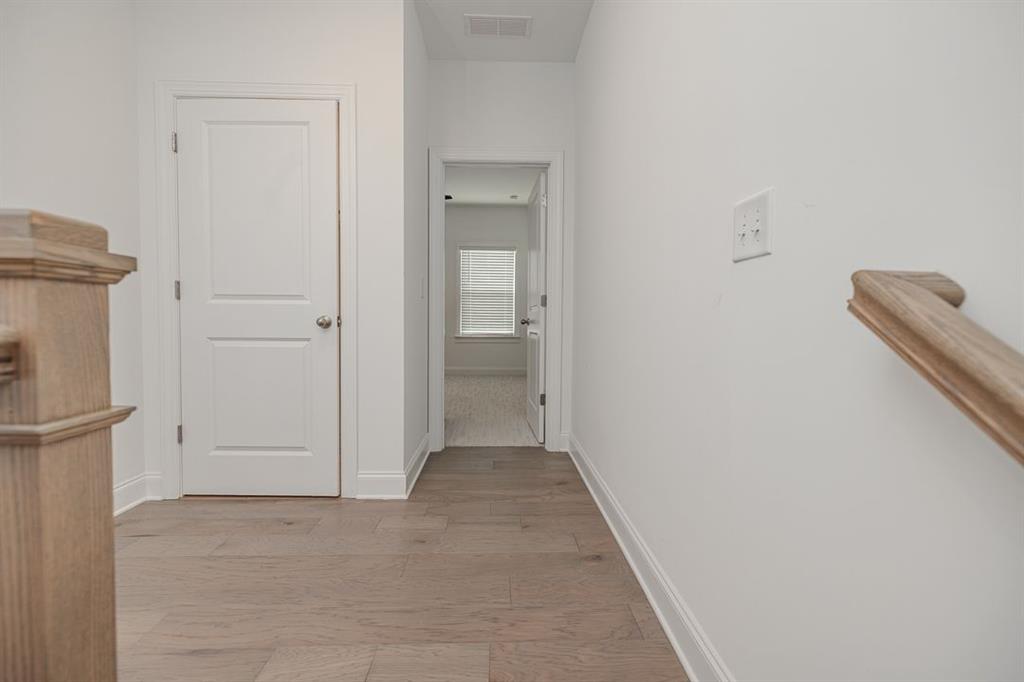 6595 Beacon Drive Atlanta, GA 30328 - Photo 21 of 36 a view of a hallway with closet