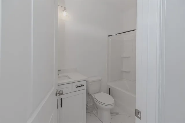 a view of a washer and dryer in a utility room