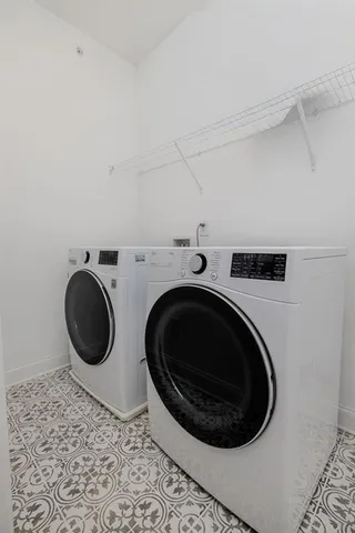 a view of a hallway with a window