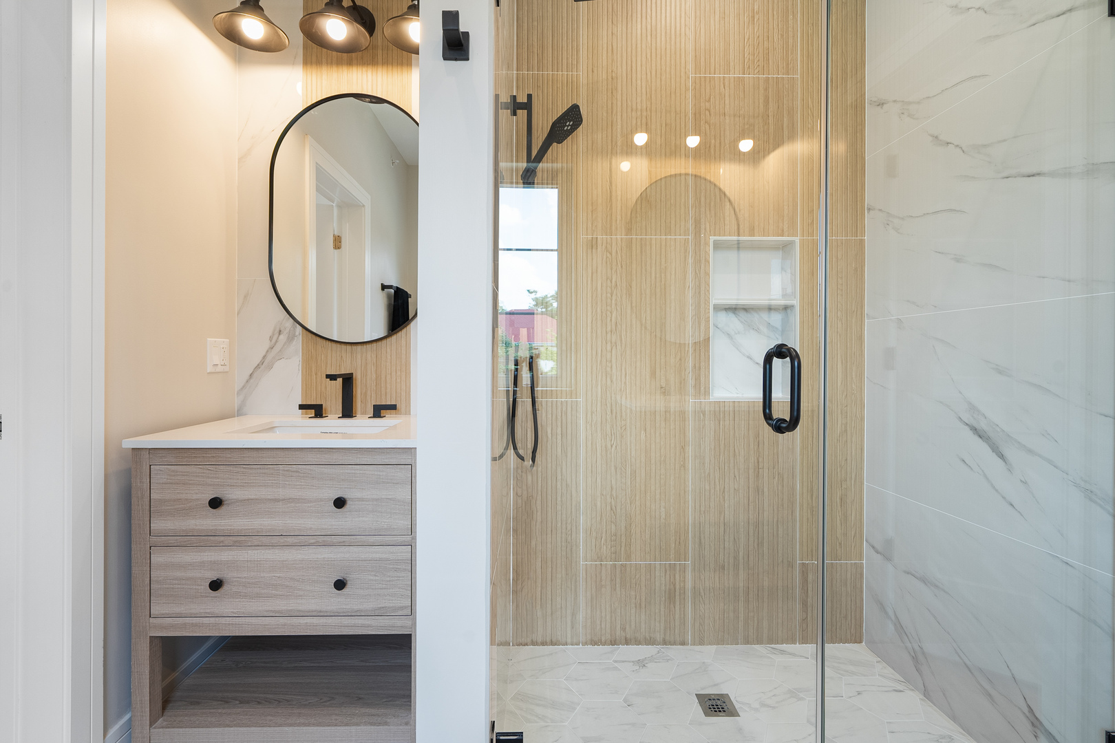 1705 South Prospect Avenue Park Ridge, IL 60068 - Photo 25 of 42 a bathroom with a sink a vanity a mirror and shower