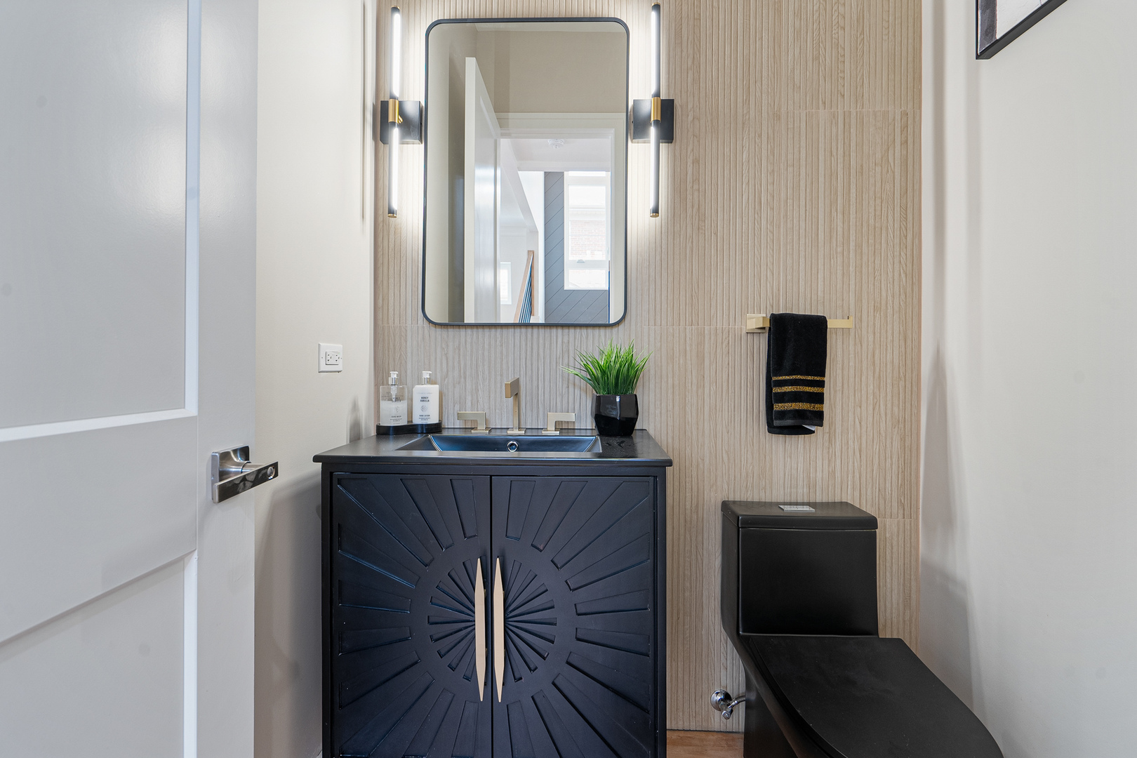 1705 South Prospect Avenue Park Ridge, IL 60068 - Photo 27 of 42 a bathroom with a sink a mirror and a toilet