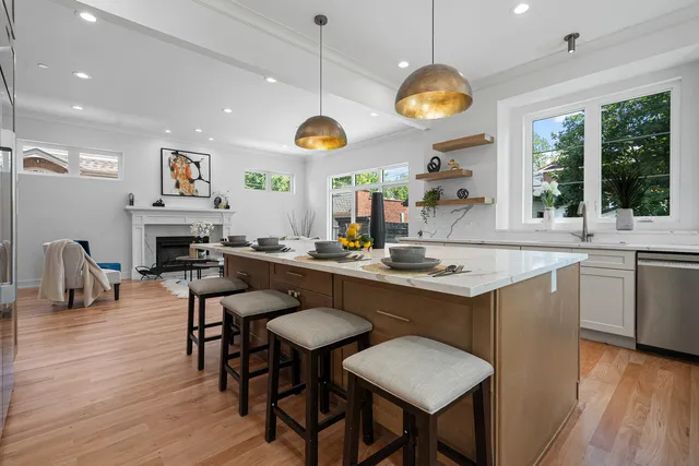 a kitchen with a table and chairs in it