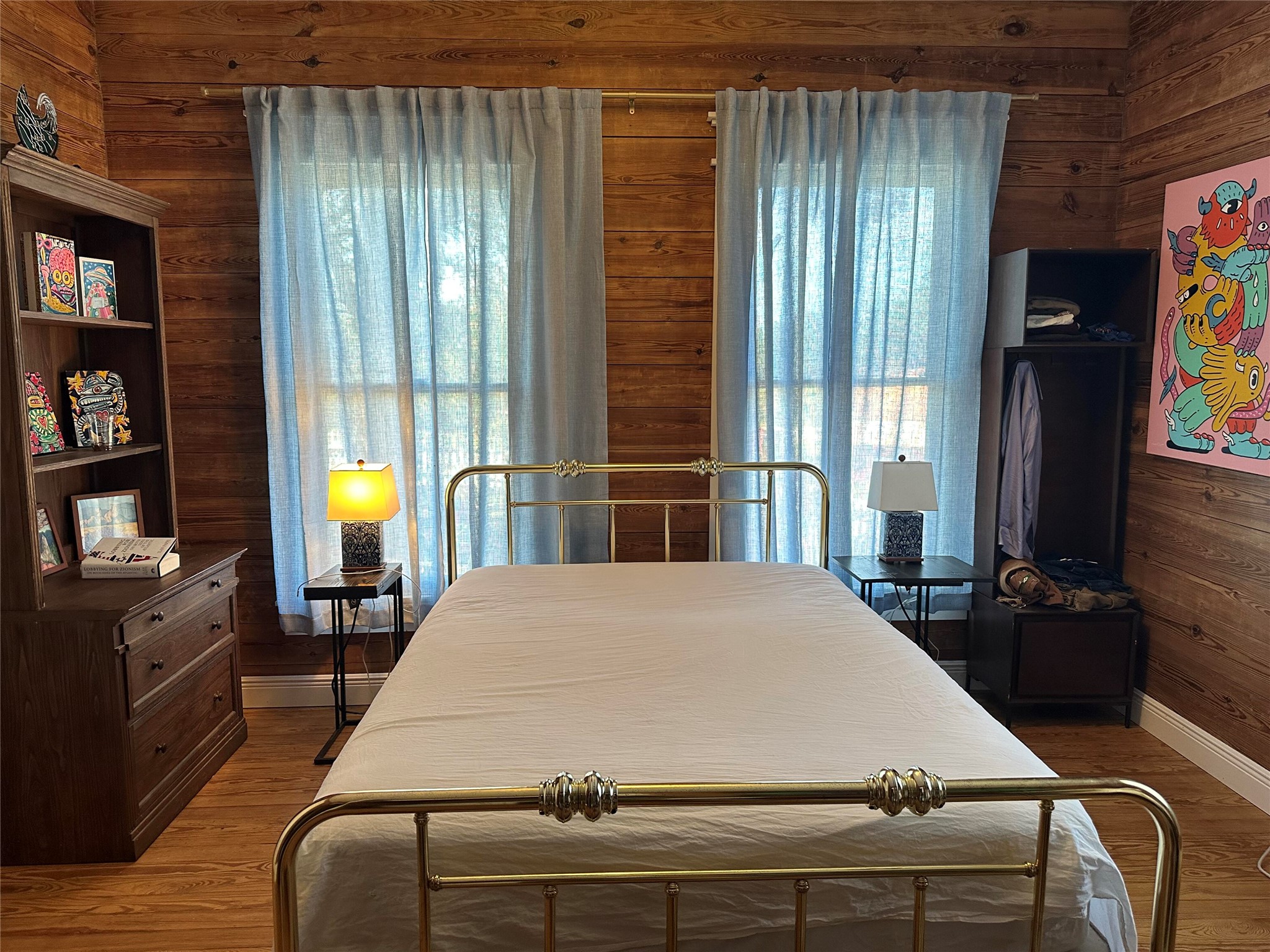 543 Narrows Road Blanco, TX 78606 - Photo 27 of 32 a room with a bed and large windows