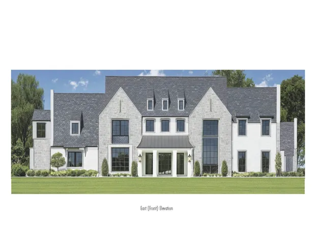 a view of a big house with a big yard and potted plants