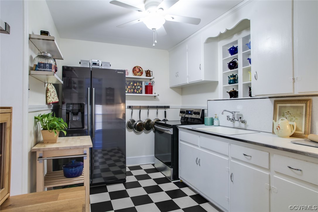 3018 Overton Road Henrico, VA 23228 - Photo 6 of 18 Kitchen features SS appliances, ceiling fan & vinyl floors