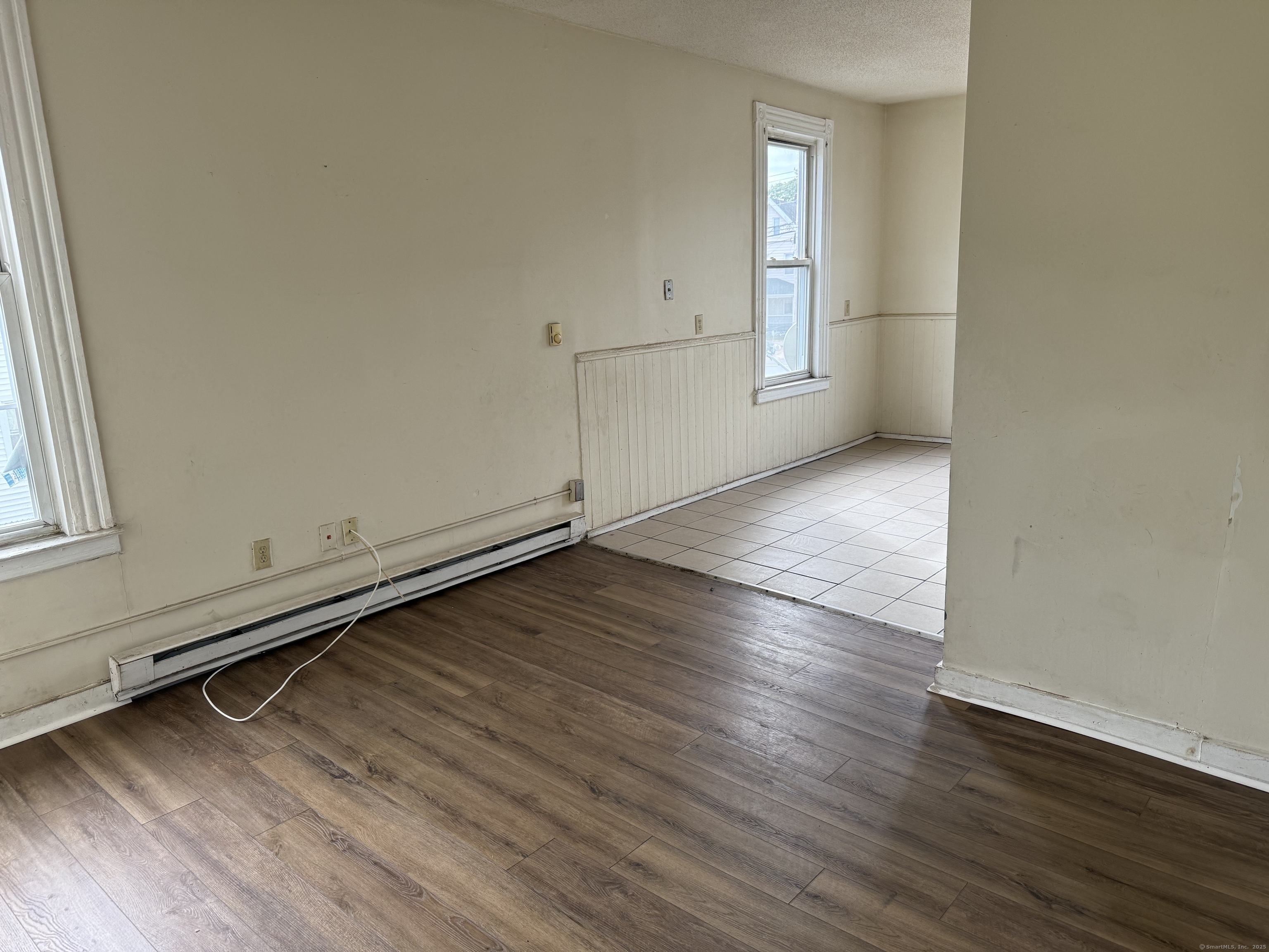 40 Shelton Avenue New Haven, CT 06511 - Photo 9 of 13 an empty room with wooden floor and windows