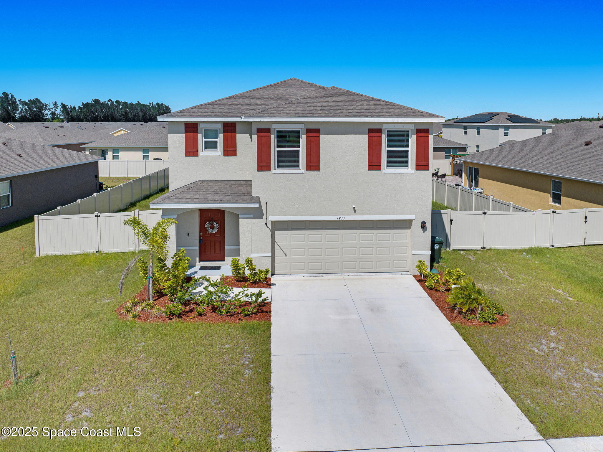 1217 Casey Avenue Rockledge, FL 32955 - Photo 12 of 49 front view of a house with a yard