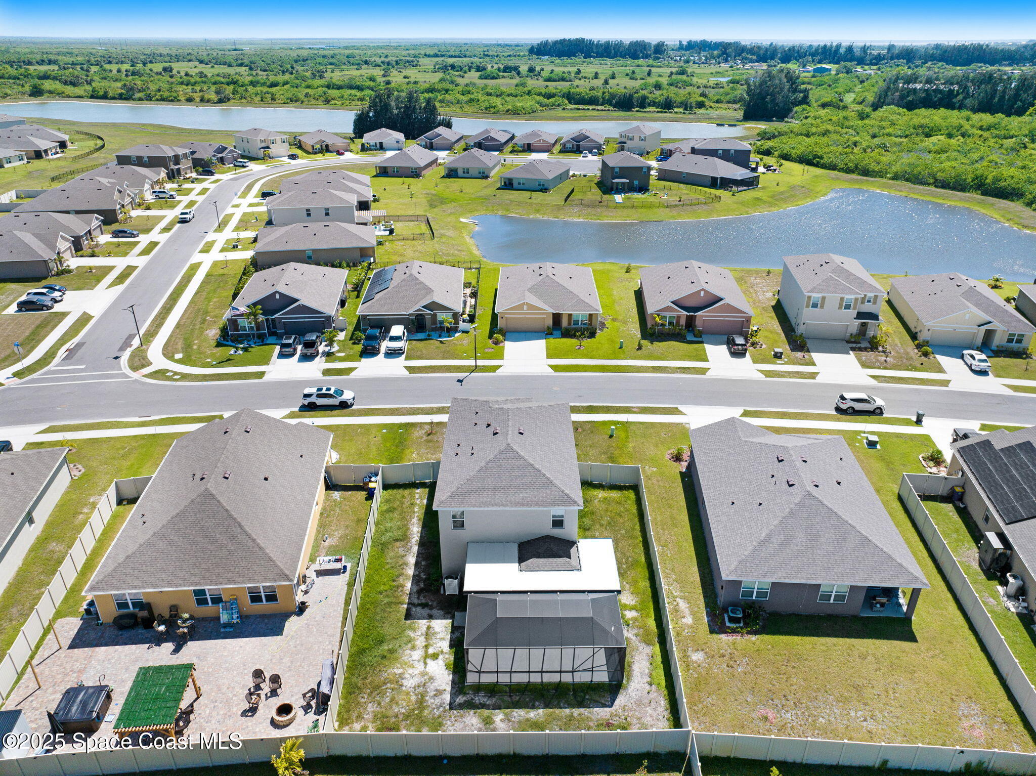 1217 Casey Avenue Rockledge, FL 32955 - Photo 13 of 49 an aerial view of houses with a swimming pool
