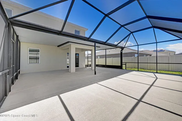 a view of a backyard of a house