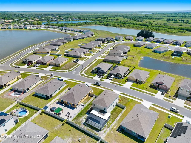 view of a balcony with two chairs