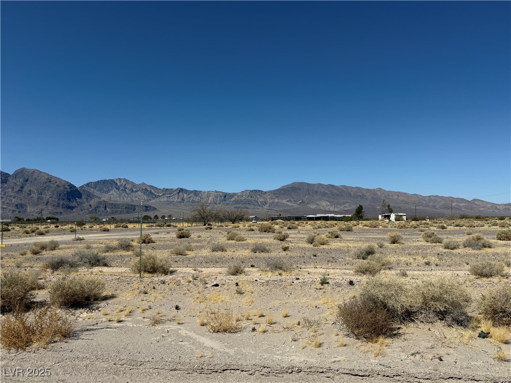 View of mountain feature with a rural view and view of desert