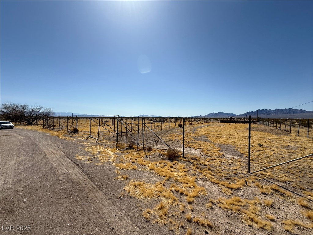 1054 Casada Road Amargosa Valley, NV 89020 - Photo 2 of 6 View of road with a rural view and a mountain view