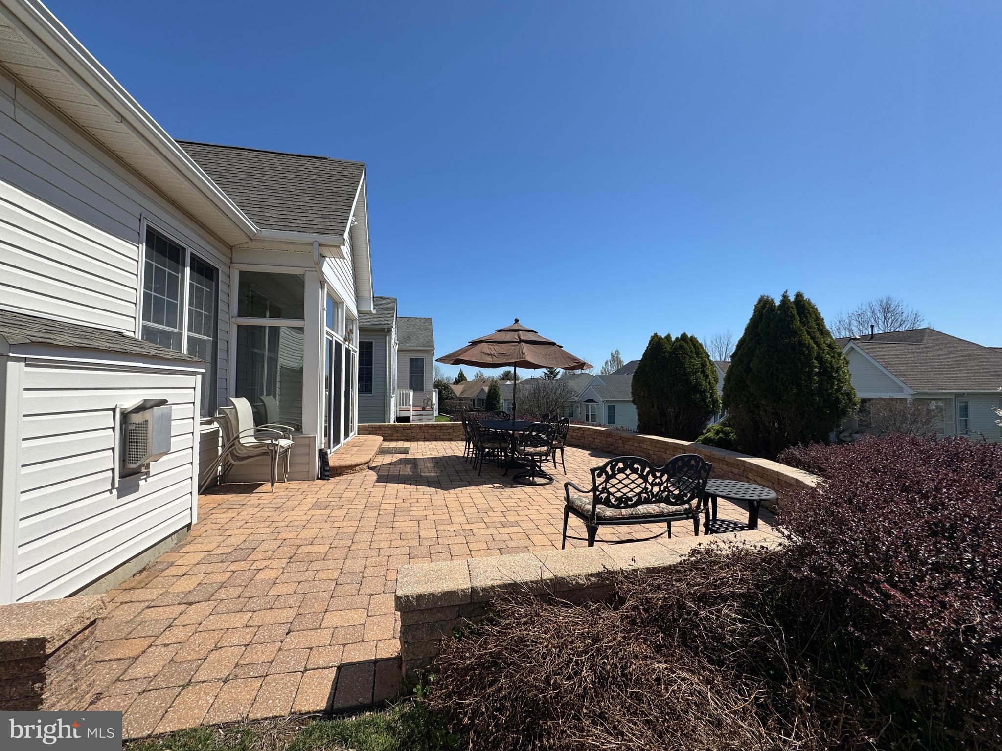 57 Nathaniel Road Holland, PA 18966 - Photo 45 of 64 Oversized Paver patio with knee sitting wall