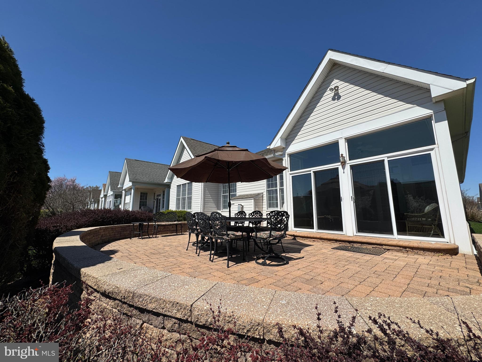 57 Nathaniel Road Holland, PA 18966 - Photo 46 of 64 Sun Room to paver patio