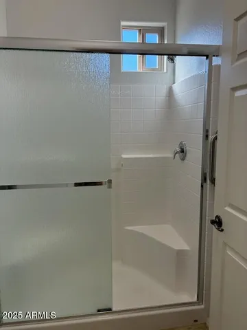 a view of a livingroom with a flat screen tv