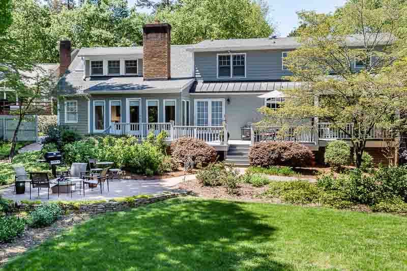 3000 Upland Circle Raleigh, NC 27607 - Photo 27 of 30 a backyard of a house with a garden and barbeque oven