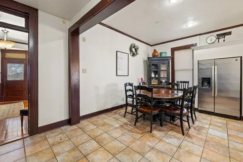 a view of a dining room with furniture