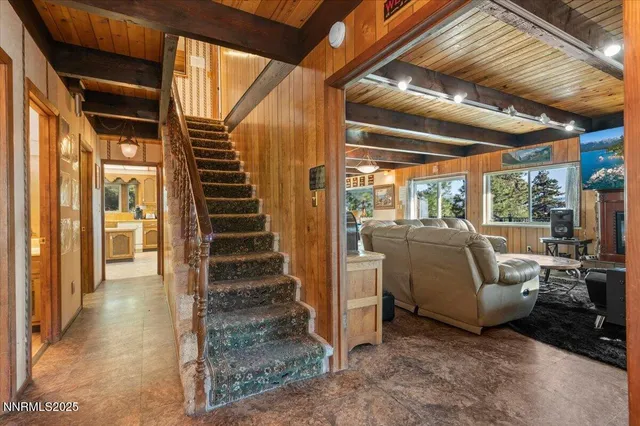 a kitchen with stainless steel appliances granite countertop a sink and a stove