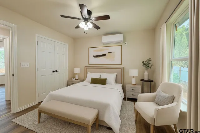 a bedroom with a bed and furniture