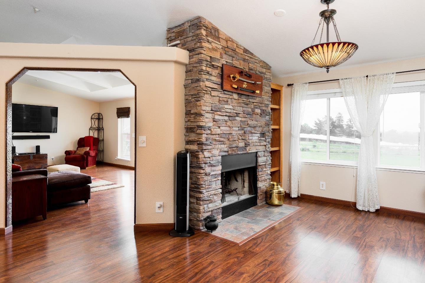 275 Orchard View Drive Watsonville, CA 95076 - Photo 11 of 25 a living room with furniture and a fireplace