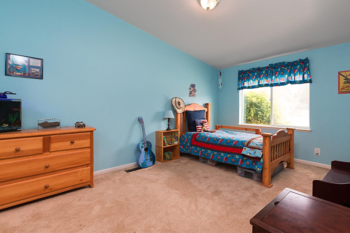 275 Orchard View Drive Watsonville, CA 95076 - Photo 15 of 25 a bedroom with a bed and window