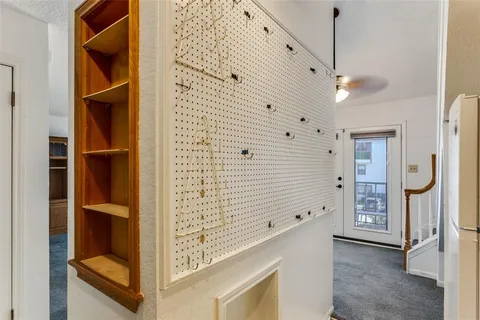 a view of a hallway with closet