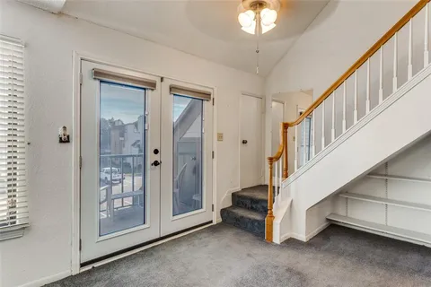 a view of an entryway with staircase
