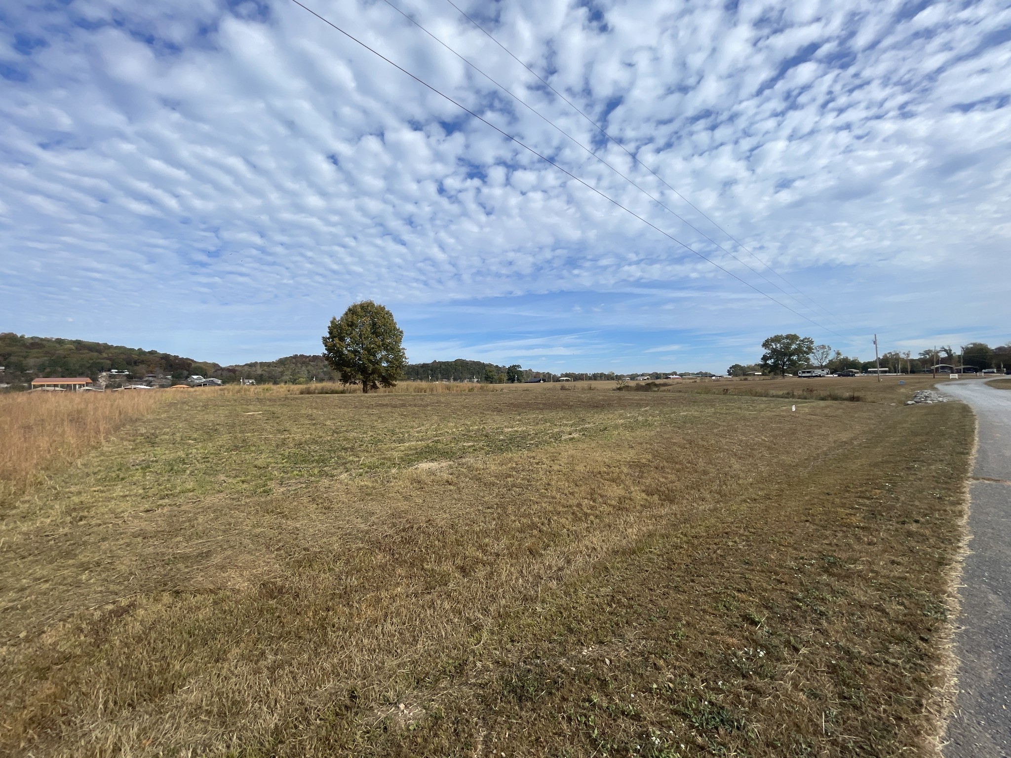 384 Duck Blind Road Clifton, TN 38425 - Photo 7 of 11 a view of a lake and mountain in the back