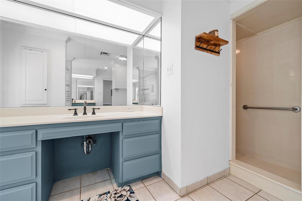 1396 Eagle Canyon Drive China Spring, TX 76633 - Photo 29 of 40 Full bath with tile patterned flooring, vanity, a shower, and crown molding