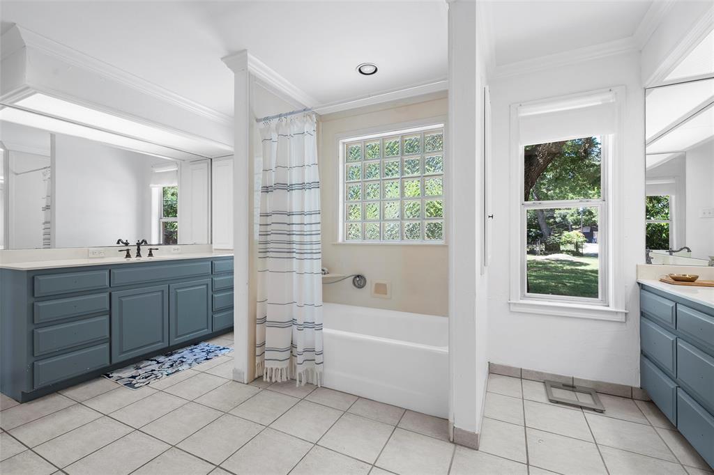 1396 Eagle Canyon Drive China Spring, TX 76633 - Photo 30 of 40 Bathroom featuring vanity, crown molding, and tile patterned floors