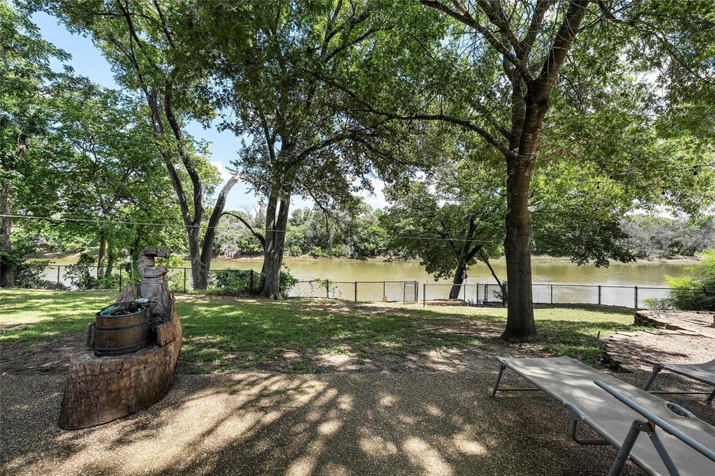 1396 Eagle Canyon Drive China Spring, TX 76633 - Photo 33 of 40 View of yard with a water view