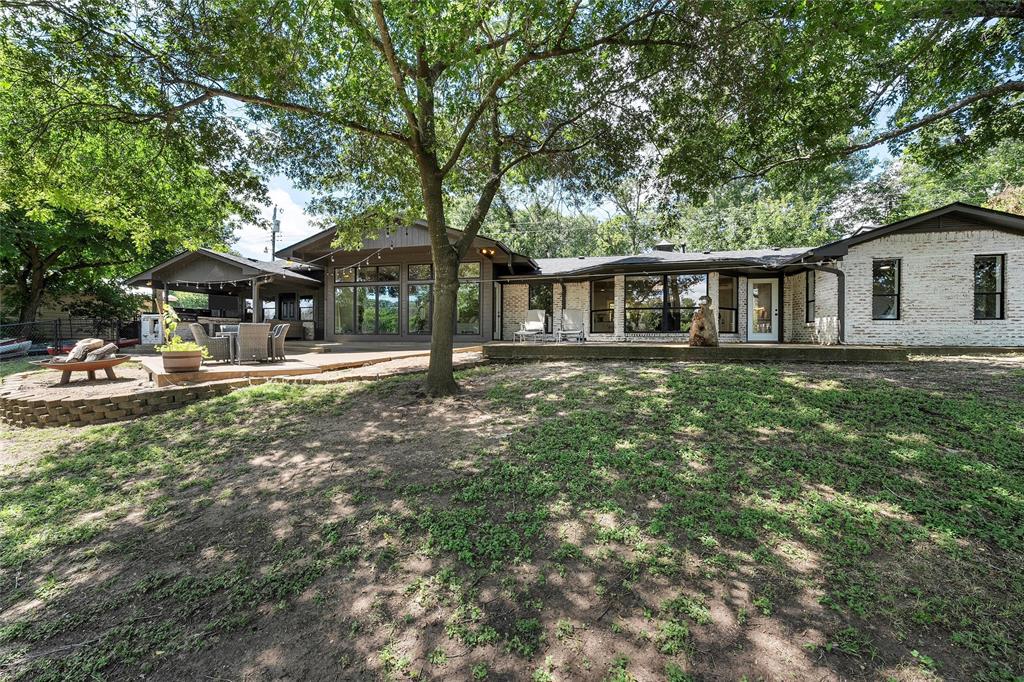 1396 Eagle Canyon Drive China Spring, TX 76633 - Photo 38 of 40 Back of property with brick siding and a patio area