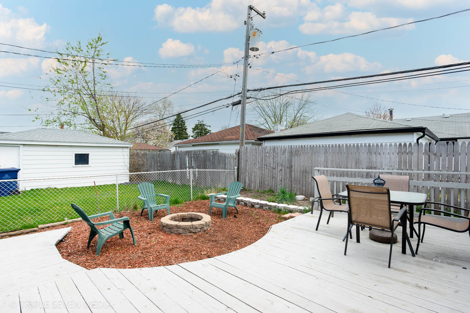 8763 South Corcoran Road Hometown, IL 60456 - Photo 8 of 28 a view of a patio with a table and chairs