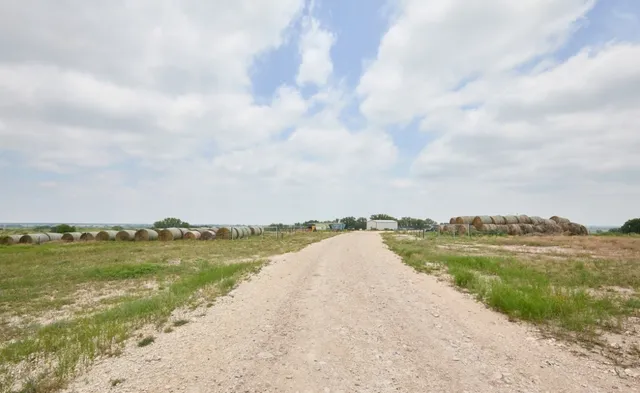 a view of a lake with a big yard