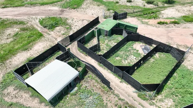 a view of a yard from a balcony