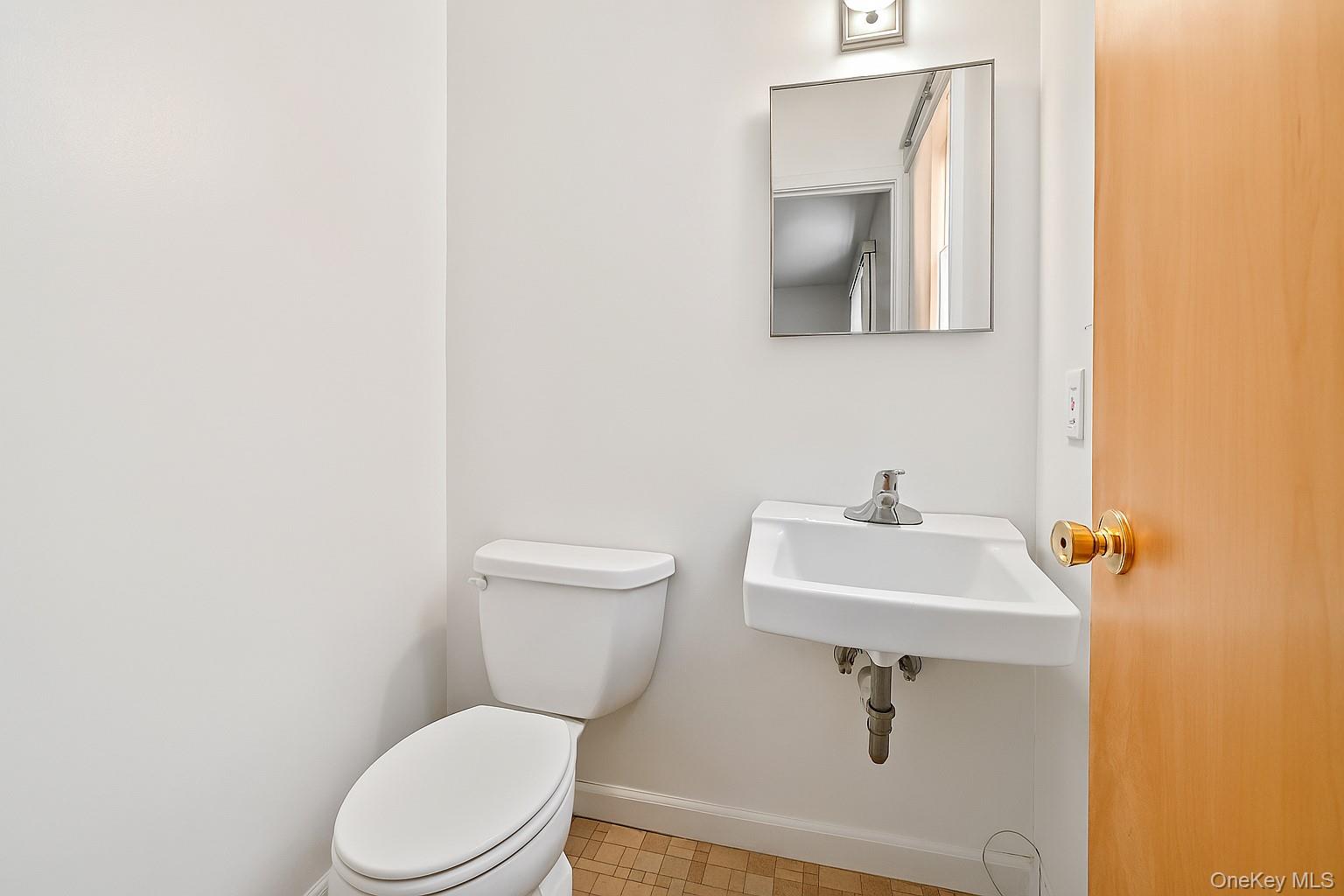 568 Manville Road, Unit UPPER R Pleasantville, NY 10570 - Photo 23 of 32 2 Piece bathroom in the primary bedroom.