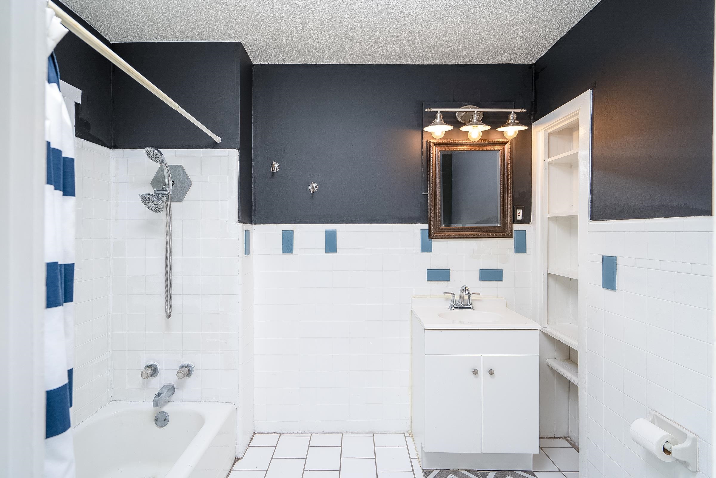 401 Zorayda Avenue St. Augustine, FL 32080 - Photo 26 of 41 a bathroom with a sink toilet and shower