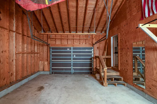 a view of room with wooden walls