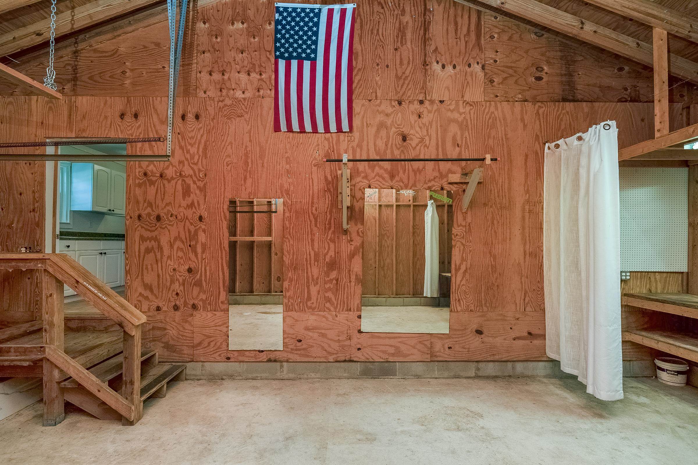 401 Zorayda Avenue St. Augustine, FL 32080 - Photo 35 of 41 a view of a house with a door and wooden walls