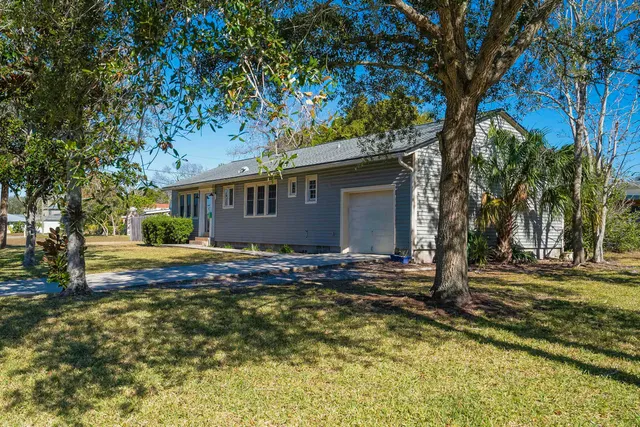 a backyard of a house with seating space
