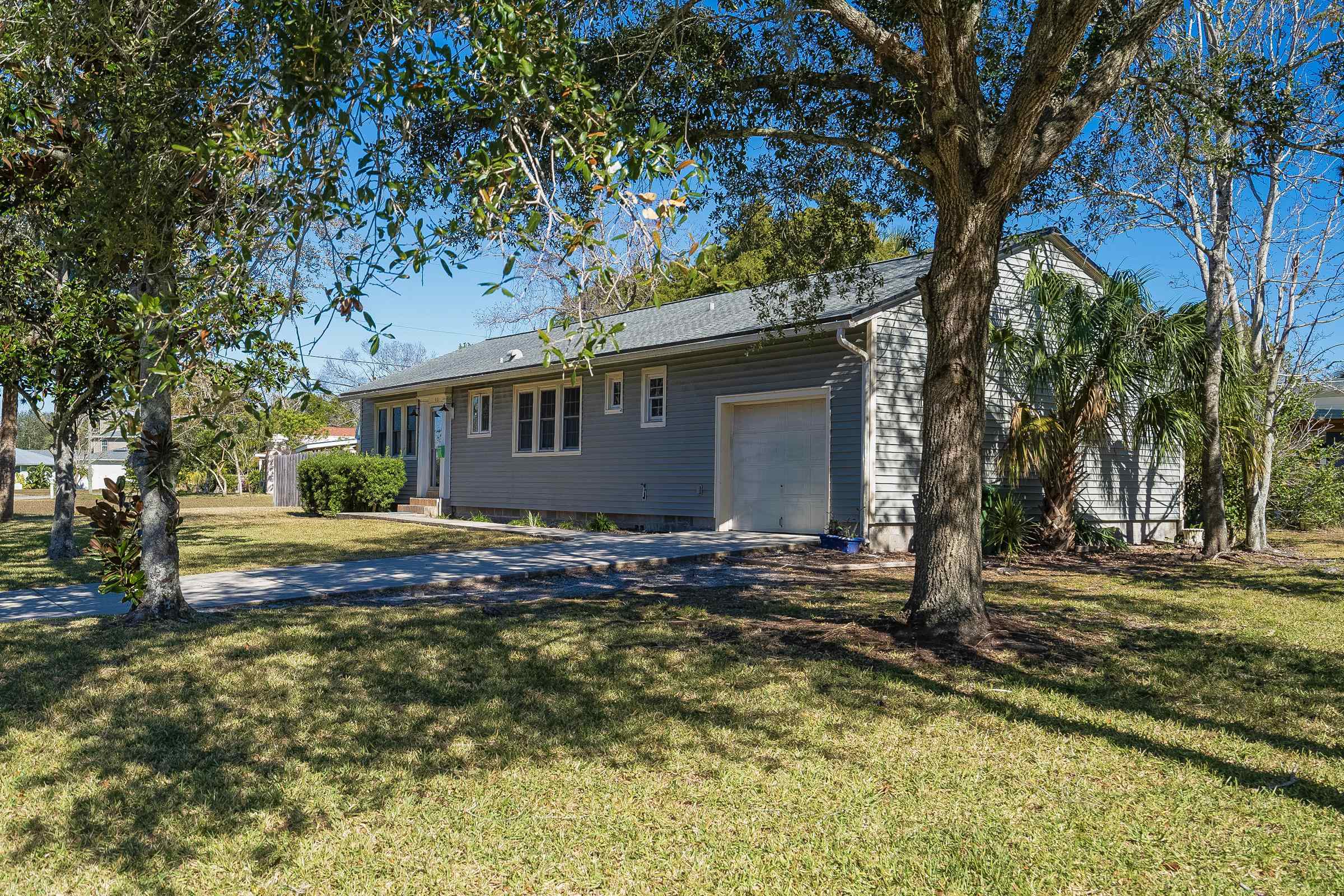 401 Zorayda Avenue St. Augustine, FL 32080 - Photo 37 of 41 a view of a house with pool and trees