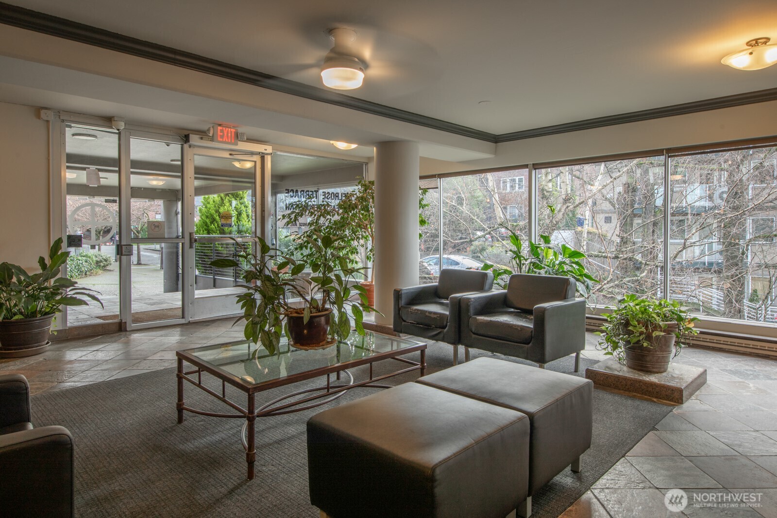 308 East Republican Street, Unit 508 Seattle, WA 98102 - Photo 27 of 27 a living room with furniture and a potted plant