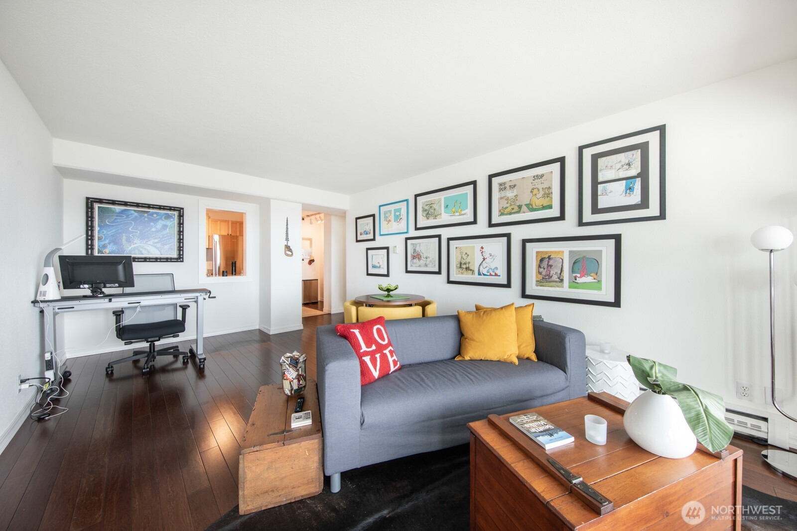 308 East Republican Street, Unit 508 Seattle, WA 98102 - Photo 9 of 27 a living room with furniture and a wooden floor