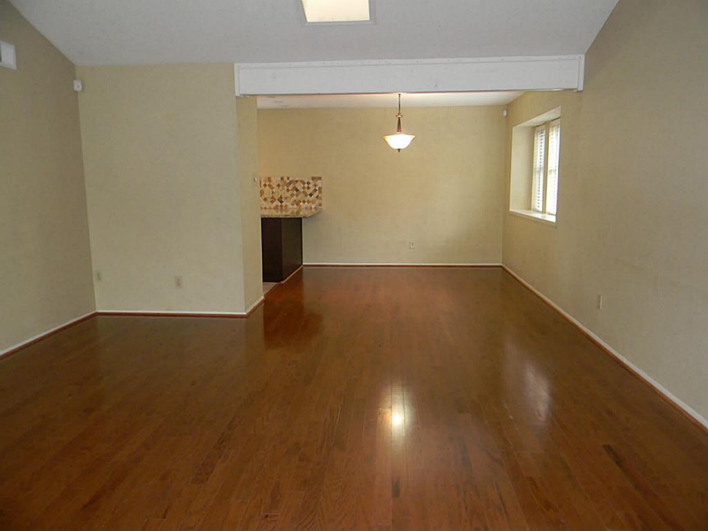 2754 Quarry Hill Road Sugar Land, TX 77478 - Photo 4 of 49 Wood floors in living/dining.