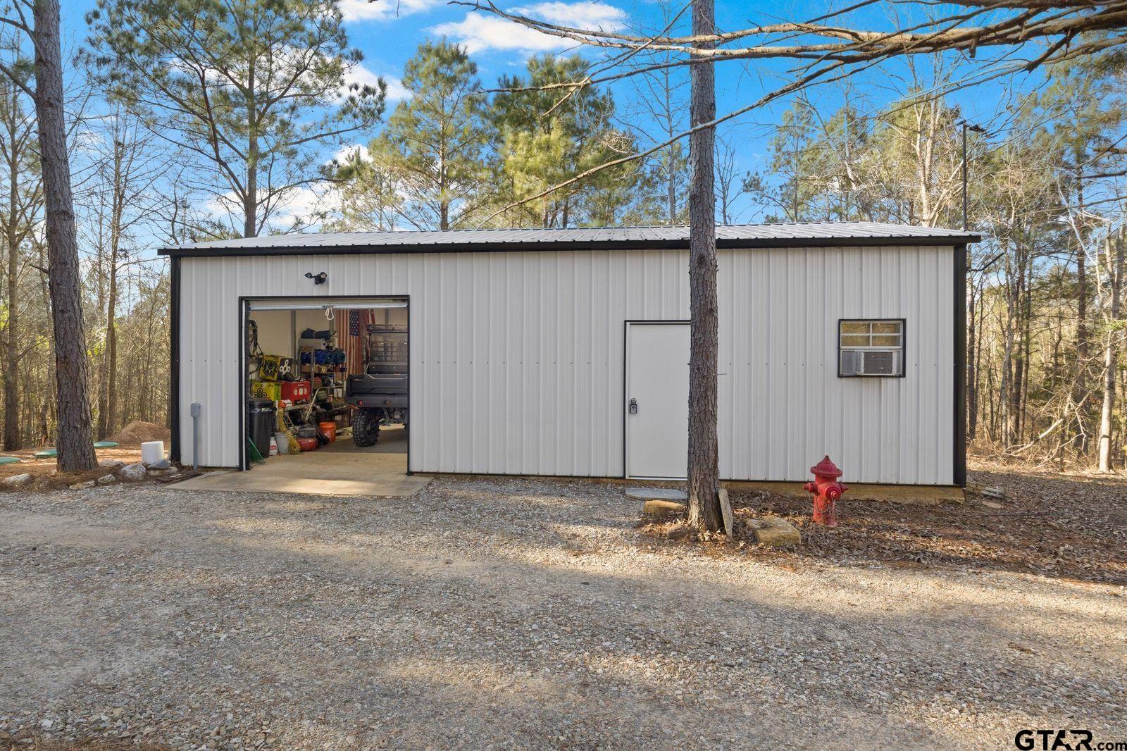 11501 Waterbuck Road Winnsboro, TX 75494 - Photo 4 of 29 a view of a car garage