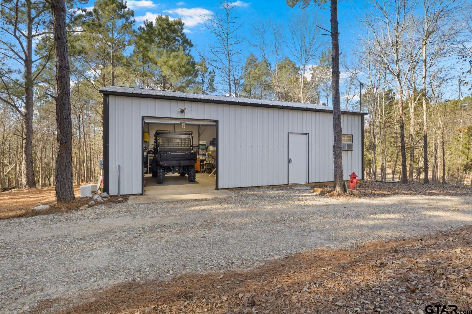 11501 Waterbuck Road Winnsboro, TX 75494 - Photo 5 of 29 a view of a house with a outdoor space