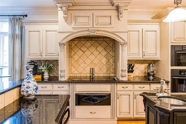 a bedroom with furniture and a flat screen tv