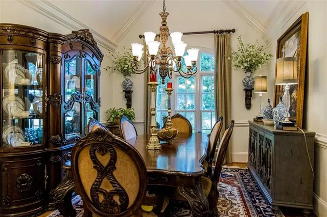 a large bathroom with a glass door shower and sink