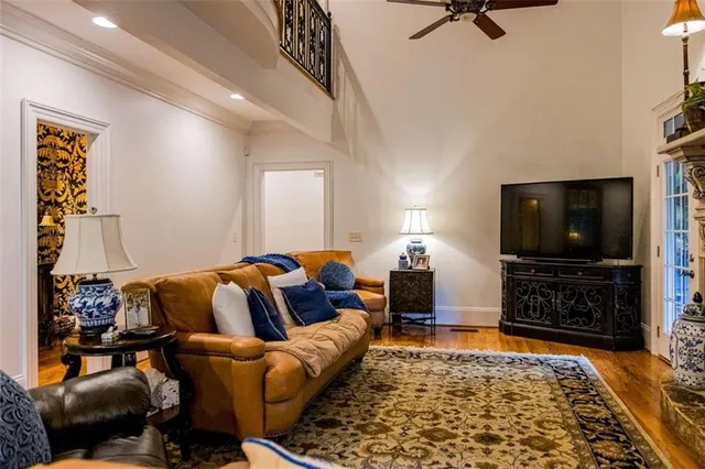 a kitchen with white cabinets and appliances